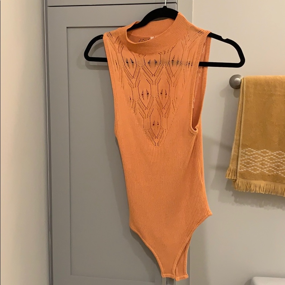 Never worn free people burnt orange bodysuit